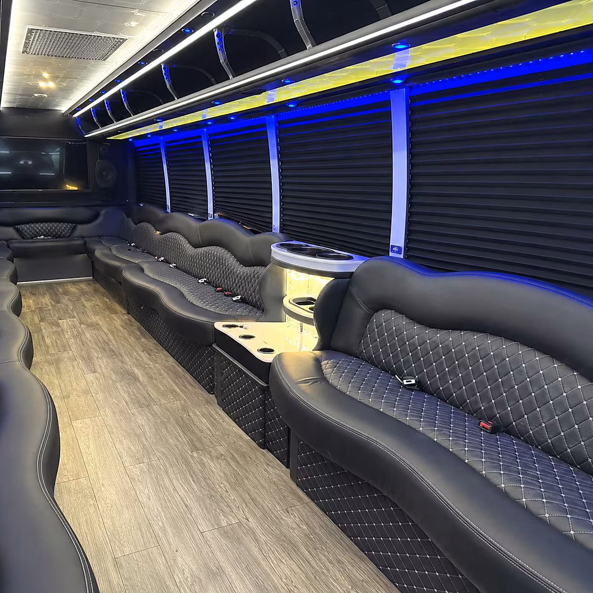 Wedding guests seated inside a party bus serving Austin